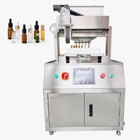 Remplisseuse automatique quantitative de petits flacons d'huiles essentielles et de parfums, idéale pour les marques en démarrage et la production en petites séries