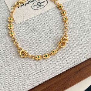 Dylam Fashion, fabricant de haute joaillerie, bracelet en argent 925 plaqué or 18 carats avec pendentif cercle fleur en zircon vert - Product Image 4