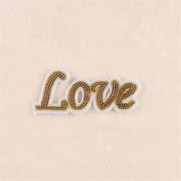 Applique brodée à repasser avec grandes paillettes, lettre dorée