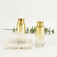 Emballage de 30ml pour cosmétiques biologiques pour soins de la peau Bouteille en verre recyclable à revêtement métallique doré avec compte-gouttes, personnalisable