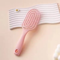 Brosse à cheveux ronde de massage du cuir chevelu bouclée mignonne de voyage personnalisée avec marque privée, massage du cuir chevelu en gros avec logo