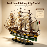 Modèle de bateau à voile vintage personnalisé en bois avec gréement multi-mâts, voiles blanches, coque jaune-noire et support noir