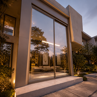 Porte coulissante panoramique ALUFRONT avec cadre fin et minimaliste, verre de sécurité, conçue pour les projets architecturaux contemporains et modernes