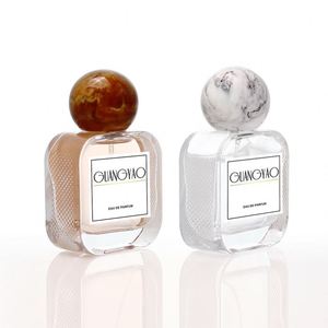Unique Rounded Shape Creative Design Perfume <b>Bottle</b> clear 50ml Custom Perfume <b>Bottles</b> 50ml with Resinous Lid - Product Image 1