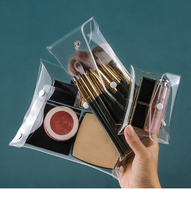 Nouveau mini petit sac transparent en PVC avec bouton, adapté aux voyages de vacances, à la salle de bain et à l'organisation de la trousse de toilette