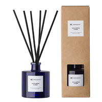 Mescente vente en gros bouteille en verre noir bâtons de rotin parfum naturel fleur huile essentielle diffuseur de roseau