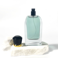Bouteille en verre de luxe de forme unique de haute qualité 100ml emballage d'huile essentielle de vaporisateur de brouillard vide transparent bouteille de parfum vide