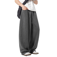 Pantalon de survêtement ample pour homme en molleton épais gris chiné, avec couture centrale, jambe large, cordon de serrage et taille élastique, vente en gros, personnalisation OEM
