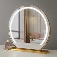Miroir cosmétique LED rond en gros avec éclairage d'appoint à variation de luminosité tactile intelligente, miroir de maquillage encadré pour coiffeuse et table de chambre
