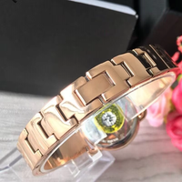 Montre pour femme avec lunette en cristal, cadran en nacre or rose, grands chiffres, élégante, à quartz, résistante à l'eau, cadeau