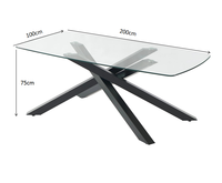 Table à manger moderne minimaliste de luxe avec plateau en verre trempé transparent, base en acier noir enduit de poudre, pieds en métal en forme de X