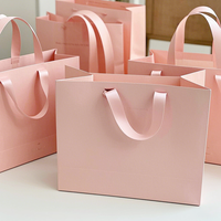 Exquise luxe eco-vriendelijke papieren tas met opdruk, ivoorwit, met handvat op handlengte, voor kleding/schoenen/bont/cosmetica/fruit