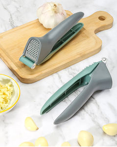 Venta al por mayor de fábrica Syh1351: Picadora y trituradora de acero inoxidable, prensa manual de ajo de cocina de material PP - Product Image 6