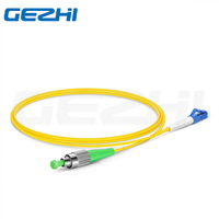 Harga pabrik OEM FC/APC ke LC/UPC Simplex OS2 Mode tunggal kabel Patch serat optik 2.0mm PVC