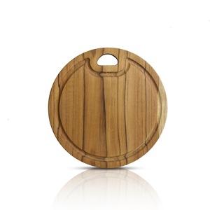 Planche à découper ronde Molita taille M, fabriquée en teck massif 100% en provenance d'Indonésie, offre une surface durable et non toxique. - Product Image 4