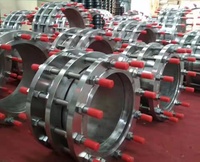 Raccord de démontage à double bride pour l'installation de vannes de conduites d'eau, joint télescopique en fonte ductile contraint avec tirants