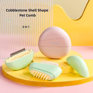 Venta caliente respetuoso con el medio ambiente 3 en 1 forma de concha de adoquines portátil peine para mascotas y cepillo de masaje de aseo con dientes de aguja - Product Image 1