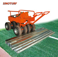 Rouleau de transport pour gazon artificiel pour l'installation
