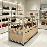 Vitrine robuste en métal argenté avec dessus en verre et base verrouillable pour boutique d'accessoires haut de gamme
