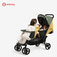 Vente en gros de poussette double pliable pour jumeaux, poussette double portable, cadre en acier inoxydable et polyester, capacité de charge de 20 kg, trajets en métro T33