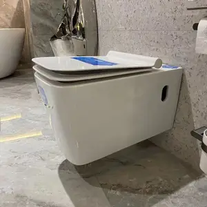 Chaozhou vente en gros pas cher prix mur suspendu wc bols de toilette une pièce en céramique blanc eau placard filigrane salle de bain accrocher des toilettes