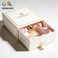 Boîte cadeau de luxe noire magnétique personnalisée pour parfum, avec insert en EVA découpé, matériaux recyclés, boîtes rigides mates pour petites entreprises