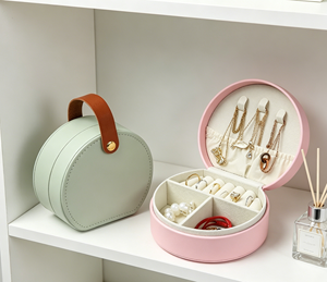 <b>Round</b> portable jewelry <b>box</b> made of premium PU leather with soft velvet lining and precise stitching process - Product Image 3