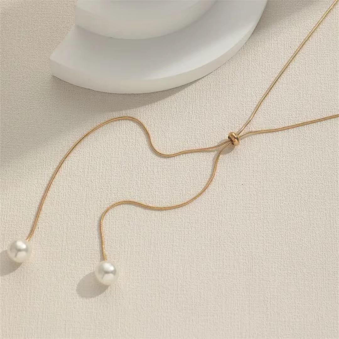 Collana lunga di perle CC