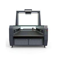 Machine de découpe laser CO2 à double tête 130W avec système de contrôle Ruida et alimentation automatique pour la production de tissus textiles et de vêtements