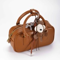 Porte-clés animalier OEM en cuir PU, motif singe avec sangle tressée et breloque de sac en métal en forme de cœur