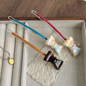 Nouvelles pinces à <span class=keywords><strong>cheveux</strong></span> haut de gamme pour femmes, avec nœud mignon et motif sucette, type <span class=keywords><strong>boucle</strong></span> grenouille pour l'arrière de la tête - Product Image 1