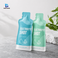 Sachets d'échantillons de gel de gingembre imprimés sur mesure thermoscellables de haute qualité, emballage en forme de bouteille plate en plastique pour aliments et miel