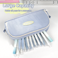 Trousse à crayons double couche grande capacité en tissu coloré avec paille décorative, design innovant et esthétique pour étudiants