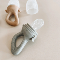 Jouet de dentition pour bébé Sucette Baby Food & Fruit Feeder dans des couleurs attrayantes en silicone pour le sevrage