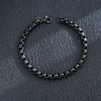 Vente en gros de bracelet en acier titane tendance hip-hop, chaîne cubaine, chaîne torsadée, fermoir à homard, bracelet noir NK pour homme