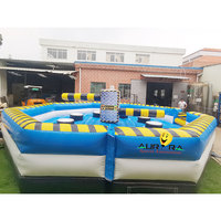 Jeux de machine pour enfants en plein air tournant avec carrousel jeux de sport gonflables jeu d'obstacles rotatifs gonflables