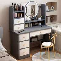 Ensemble de coiffeuse moderne avec miroir LED rond, plusieurs tiroirs et étagère de rangement ouverte pour chambre à coucher domestique