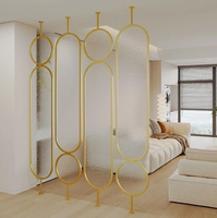 Paravent en métal moderne de luxe rotatif avec design découpé au laser pour salon
