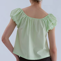 Blouse décontractée unie à col en V et manches bouffantes avec nœud sur le devant, design personnalisé pour femme, vente en gros