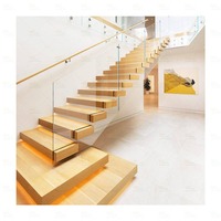 Escalier moderne en bois de chêne blanc massif avec marches flottantes et éclairage LED pour appartement et villa