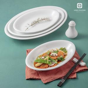 Vente en gros de vaisselle en céramique Horeca Assiette plate lisse ovale en porcelaine blanche personnalisée pour hôtels et restaurants - Product Image 4