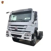 China Sinotruk 6X4 10 Wiel Tractor Howo Truck Diesel Blauw Hoofd Doos Motor Bruto Wiel Kleur Voor Verkoop
