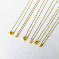 EMANCO Collier en acier inoxydable plaqué or, nouveau pendentif ajouré avec lettres minuscules perforées A-Z, réglable, accessoires pour femmes