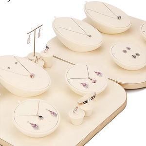 Jinsky, venta al por mayor, estante de joyería de Metal, juego de exhibición Beige con forma especial para anillo, pendiente, colgante, Base de marco de Metal - Product Image 1