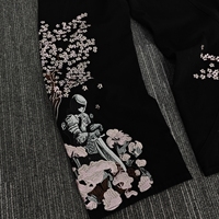Jean baggy vintage noir délavé à l'acide pour homme, coupe droite, avec broderie 3D surdimensionnée et motif de designer, style hip-hop
