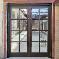 Porte d'entrée extérieure de style KFC en alliage d'aluminium avec design moderne et fonction coupe-vent pour usage commercial, hôtels, centres commerciaux