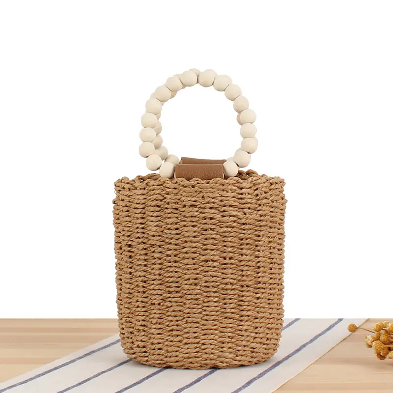 Borsa a secchiello in paglia intrecciata a mano da spiaggia estiva Boho da donna con manico rotondo in perline di legno