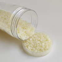 Adhésif thermofusible EVA granule jaune colle thermofusible à réglage rapide pour l'étanchéité de la boîte