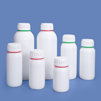 Kundenspezifische 200ml 250ml 300ml 400ml 500ml 1L weiße Kunststoff-Coex-Flasche mit rot-grünem Farbring um den Verschluss
