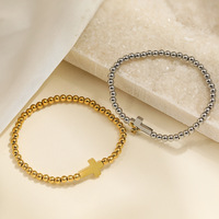 Bracelet à perles croisées plaqué or 18 carats, en acier inoxydable inaltérable, idéal pour un cadeau